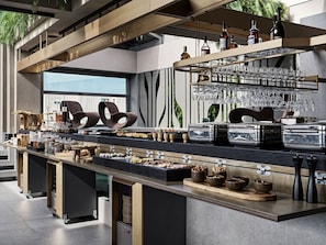 A modern bar area with a variety of glassware, bottles, and food items. - The Chania Hotel (Chania)