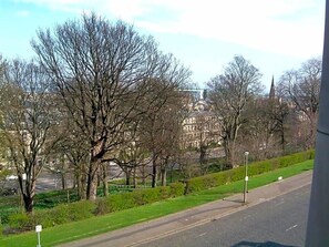A road with trees and a distant building. - Terrace Hotel (Edinburgh)