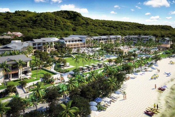 A resort with multiple buildings, a pool area, and a beach. - Canopy by Hilton Seychelles (Mahé Island)