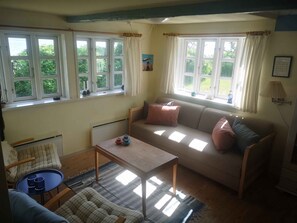 Living area - Cozy holiday home located right on the beach (Børkop)