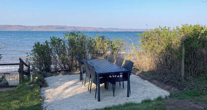 Cozy holiday home located 'right on the beach'