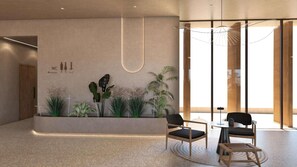 Un intérieur moderne avec un espace salon, des plantes et un luminaire fixé au mur.