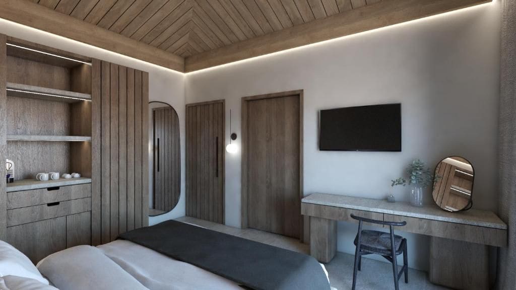 Un dormitorio moderno con cama, escritorio y armario.