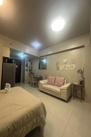 Living area - PRS at One Palm Tree Villa Near Airport (Pasay)