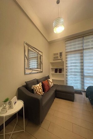 Living area - PRS at One Palm Tree Villa Near Airport (Pasay)