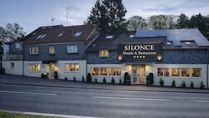 A two-story building with a sign reading 'Silence Hotels & Restaurant.' - Hotel Radevormwald (Radevormwald)