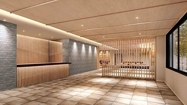 A reception area with a check-in counter, seating area, and a view through a window. - Kyoto Plaza Hotel Kintetsu Jujo (Kyoto)