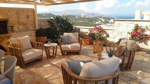 Terrace/patio - Family 5BR Villa with sea views, private pool, summer kitchen & spacious garden (Almyrida)
