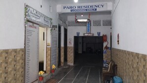 A hallway leading to a 'PARO RESIDENCY' with a sign indicating 'LODGING ONLY'. - Hotel Paro Residency (Leh)