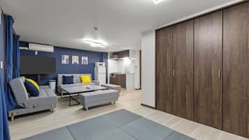 Comfort Apartment, 1 Bedroom, Non Smoking, Private Bathroom | Living area | 50-inch Smart TV with cable channels, Netflix, streaming services