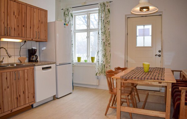 Fridge, stovetop, dishwasher, coffee/tea maker