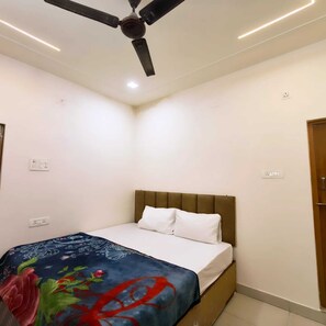 デラックス ルーム | 可動式ベッド、WiFi (無料)、ベッドシーツ