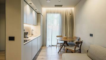 Superior-Suite | Wohnbereich | Fernseher