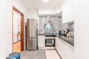 Private kitchen - Cozy Stay. (Caniço)