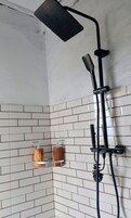 Double Room, Ocean View | Bathroom | Shower, hair dryer, towels, soap