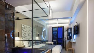 Suite, Sea View | Hypo-allergenic bedding, in-room safe, laptop workspace, blackout drapes