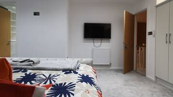 4 camere, una scrivania, ferro/asse da stiro, Wi-Fi gratuito