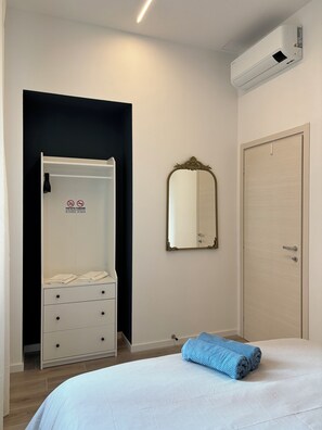 1 habitación, tabla de planchar con plancha, wifi y ropa de cama 
