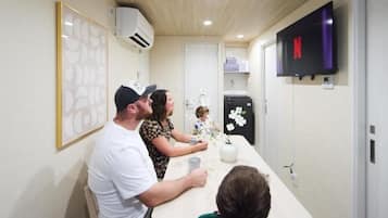 Deluxe Apartment, Balcony, City View | Dining