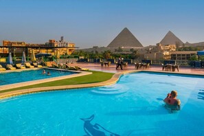 Deluxe Double Room, Balcony, City View | Pool | Indoor pool, outdoor pool - Regency Pyramids Hotel (Giza)