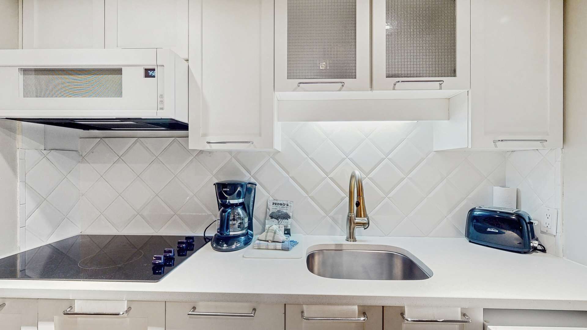 Fridge, microwave, coffee/tea maker, toaster