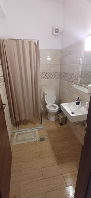 Hair dryer, towels, soap, toilet paper