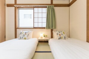 2 chambres, fer et planche à repasser, accès Internet, draps fournis