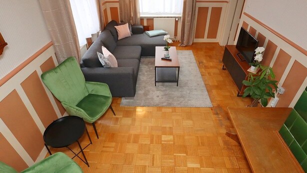 A living room with a sofa, chairs, a coffee table, and a TV. - Bertsche 3 Schlafzimmer by Interhome (Rietheim)