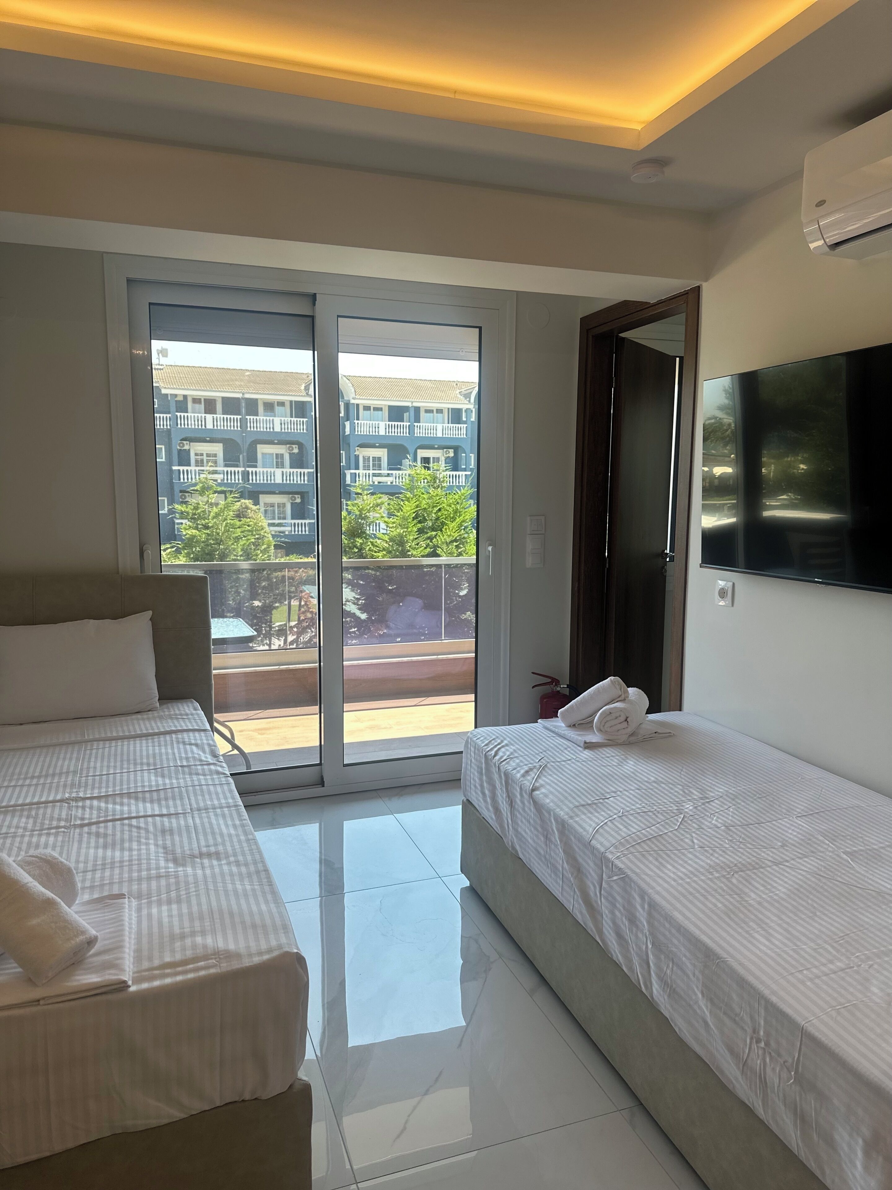 Apartamento familiar, vistas parciales al mar | Wifi gratis y ropa de cama