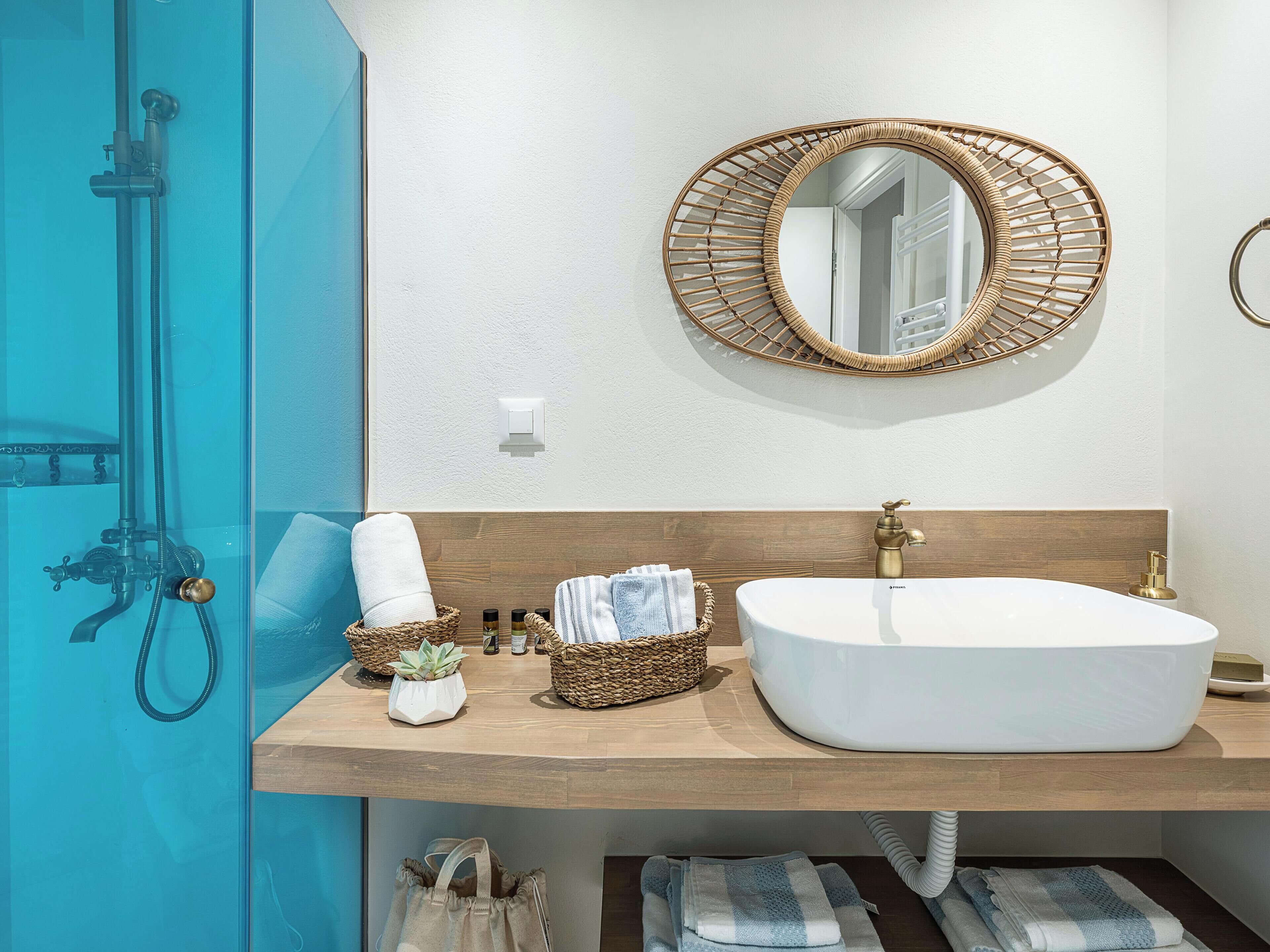 Allegra | Bathroom | Shower, rainfall showerhead, hair dryer, towels