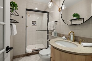 Shower, hair dryer, towels