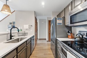 Microwave, stovetop, coffee/tea maker, cookware/dishes/utensils - Frisco Mountain Condo | Near Ski Resorts (Frisco)