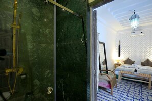 Shower, free toiletries, hair dryer, towels