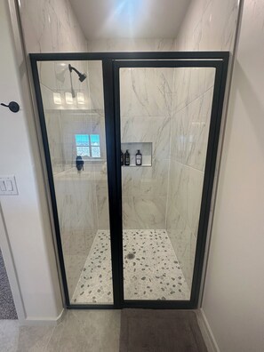 Shower, hair dryer, towels, soap