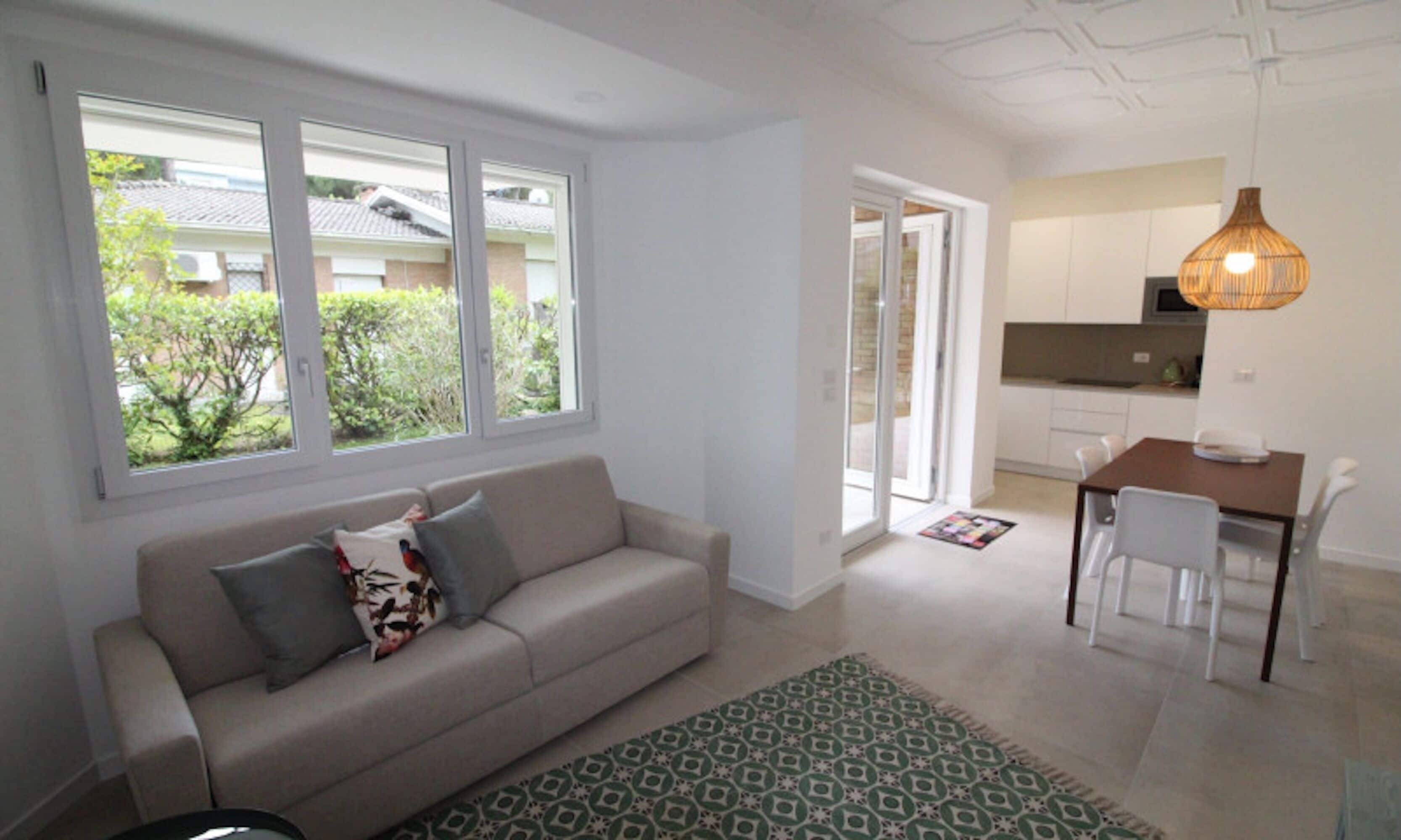 Villa, 2 slaapkamers, patio, uitzicht op tuin | Woonkamer