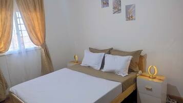 2 habitaciones, tabla de planchar con plancha y wifi gratis