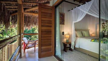 Deluxe House, Lanai, Garden View | In-room safe, desk, laptop workspace, blackout drapes