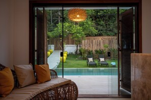 Casa Deluxe, lanai, vistas al jardín | Interior