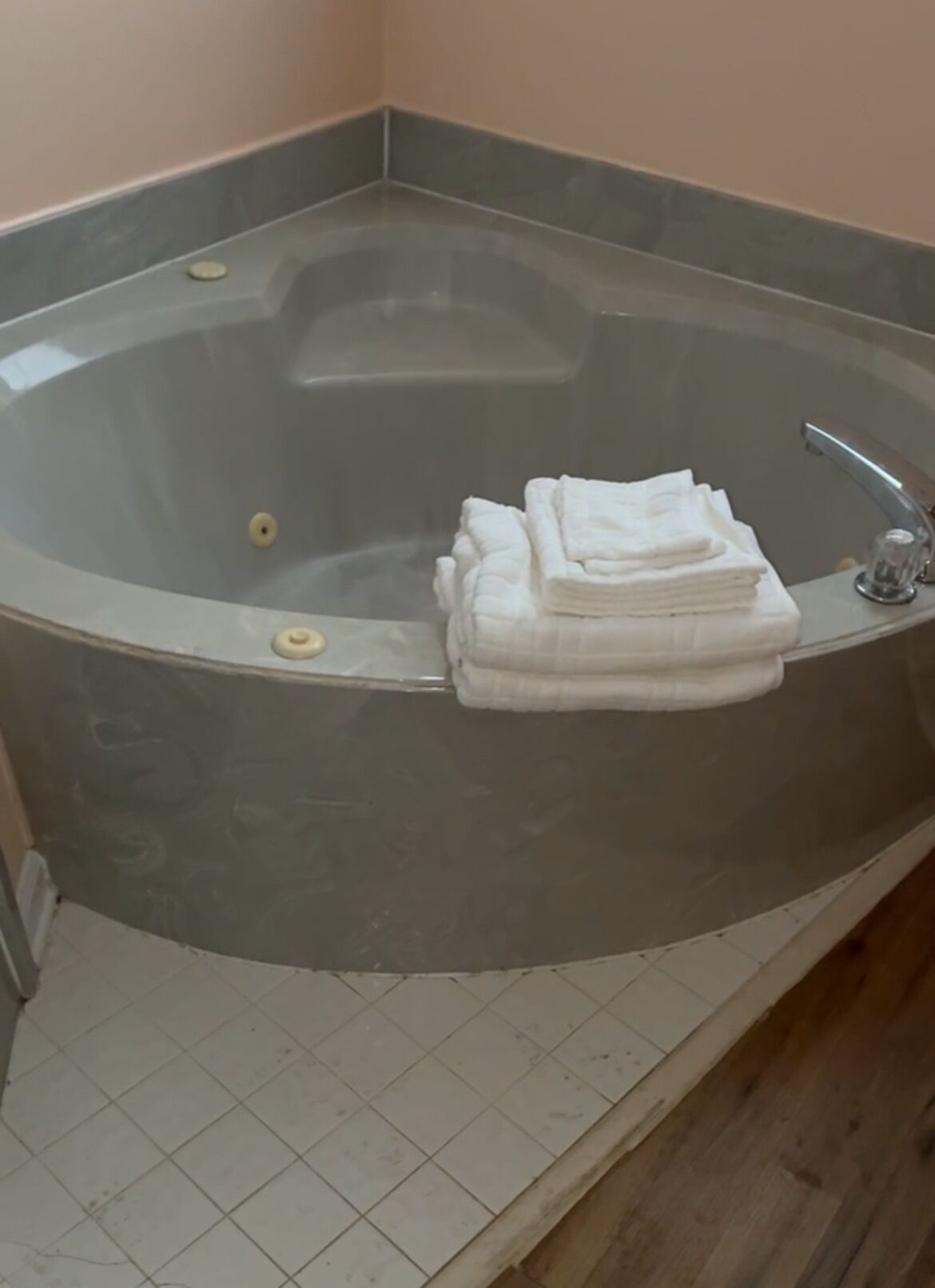 Jetted tub, towels, toilet paper