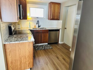 Fridge, microwave, oven, stovetop - Stone & Shore Lake House: Modern Rustic Lakefront retreat with stunning views (Lake City)