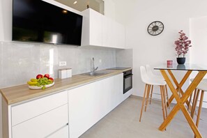 Private kitchen - Beachfront Orange Apartment (Žrnovo)
