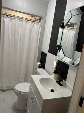 Hair dryer, towels, soap, toilet paper