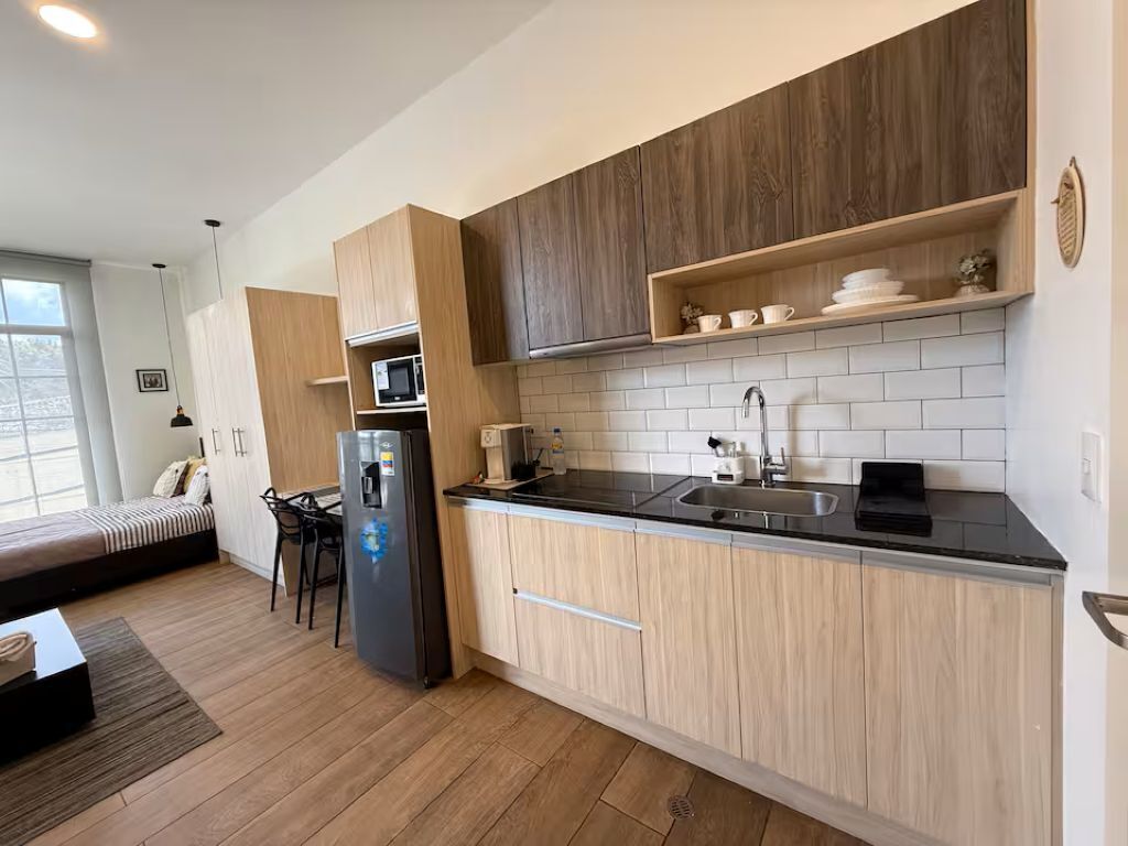 Fridge, microwave, stovetop, coffee/tea maker