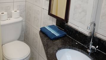 Separate tub and shower, toilet paper