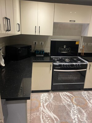 Microwave, oven, stovetop - 3-bedroom apartment in gorgeous SHIKH ZAYED with AC and comfort (giza)
