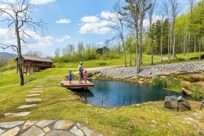 Property grounds - Mountain Bliss Cabin with Scenic Mtn Views and Pond (Spruce Pine)