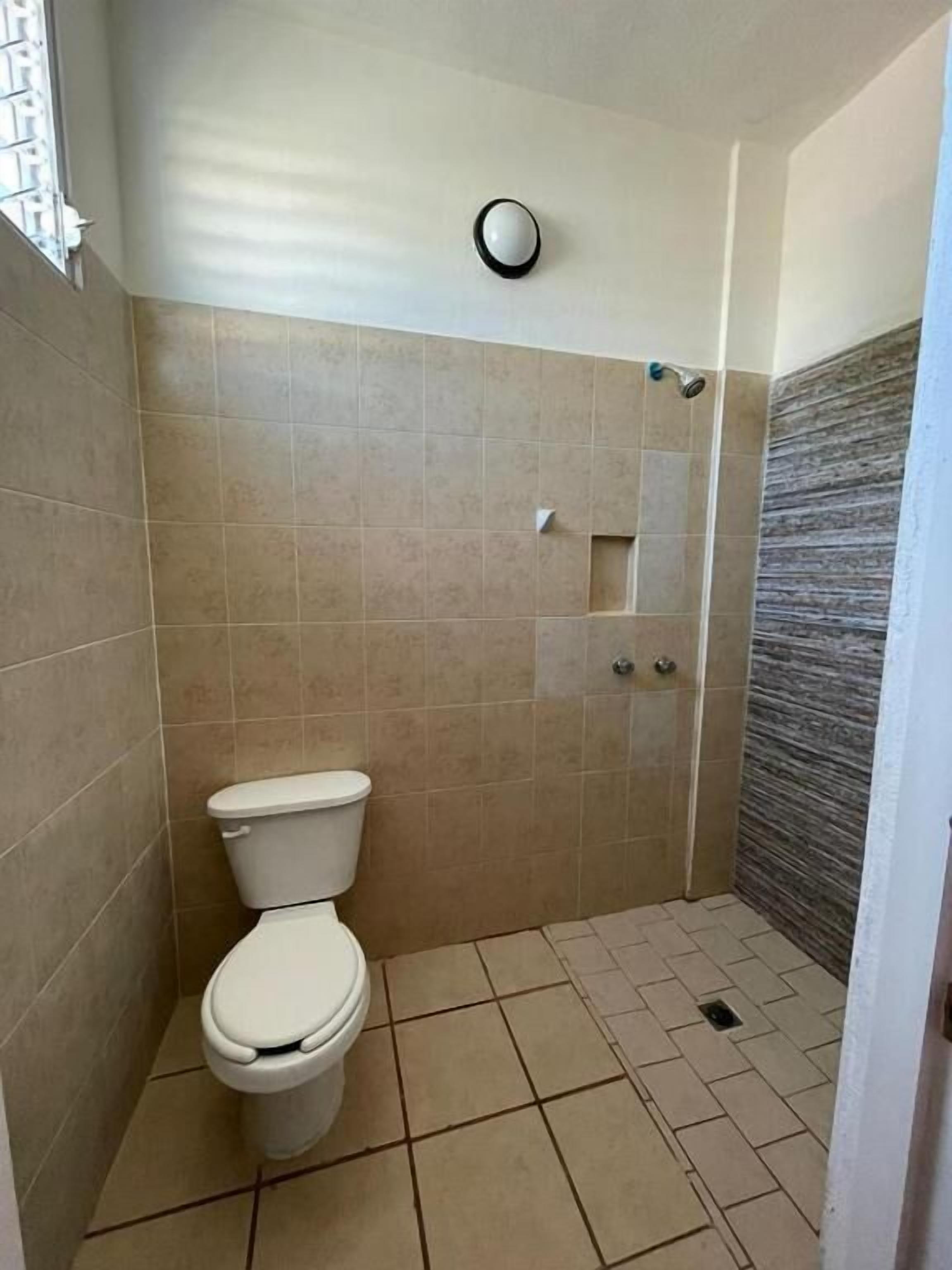 Shower, towels, soap, shampoo