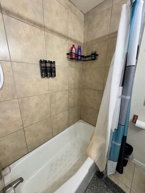 Shower, hair dryer, towels, soap