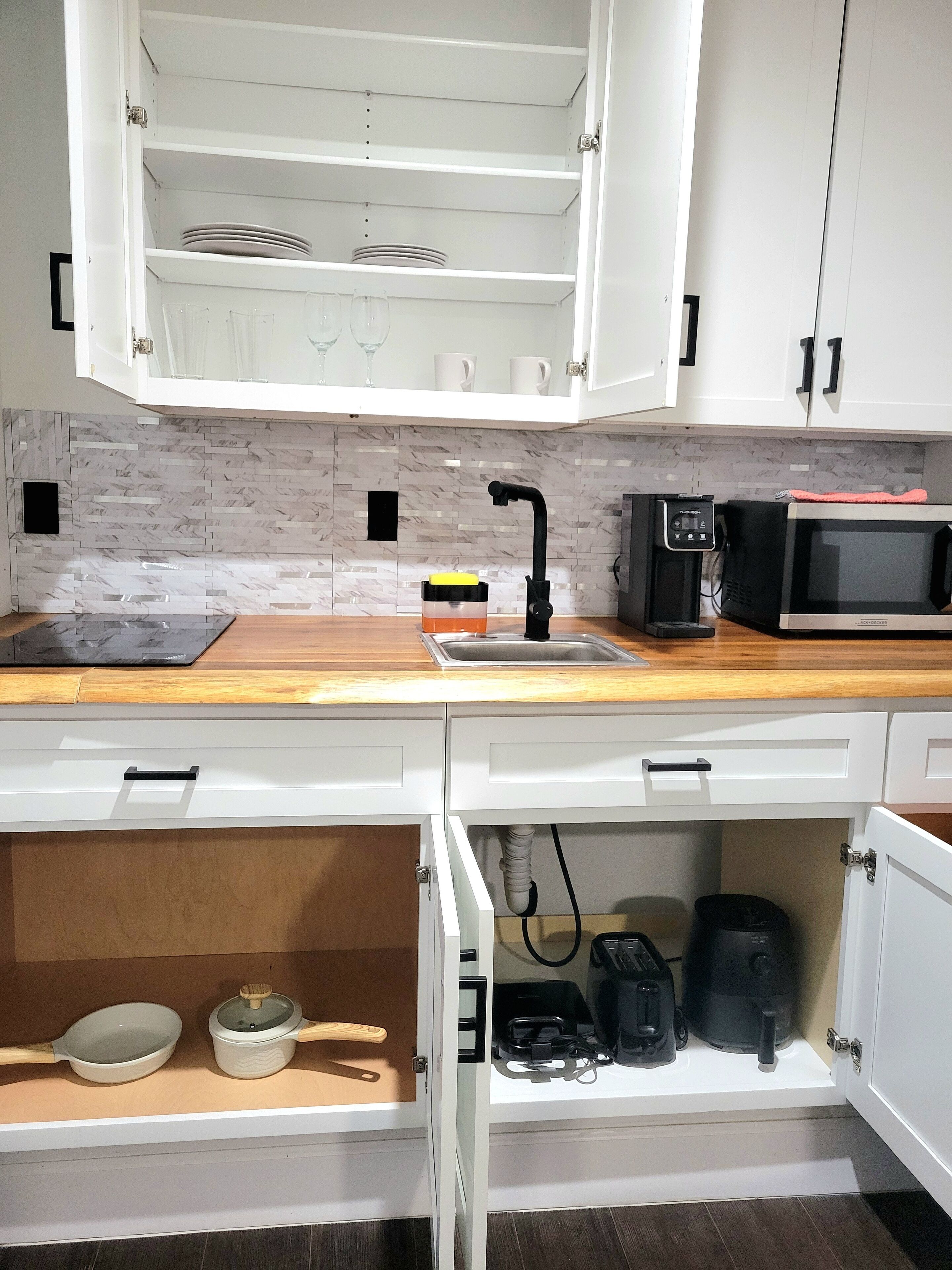 Microwave, stovetop, coffee/tea maker, toaster