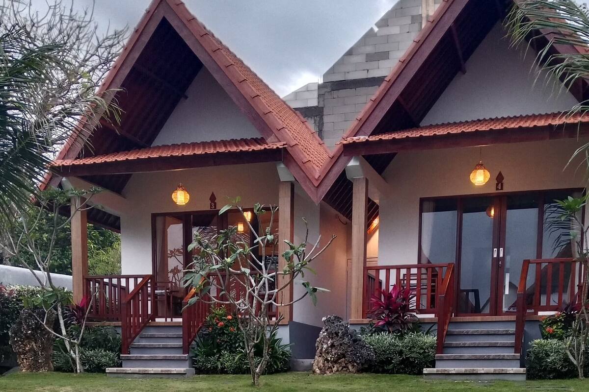 Kamar Double Deluks, pemandangan kolam renang | Resepsionis